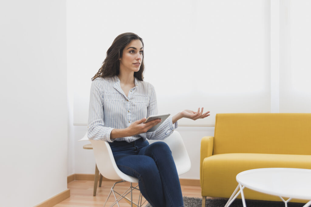 pretty worker making gestures someone