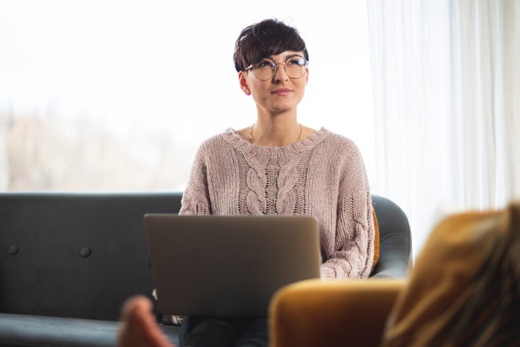 woman with laptop at home focus and planning 2024 10 31 02 35 09 utc